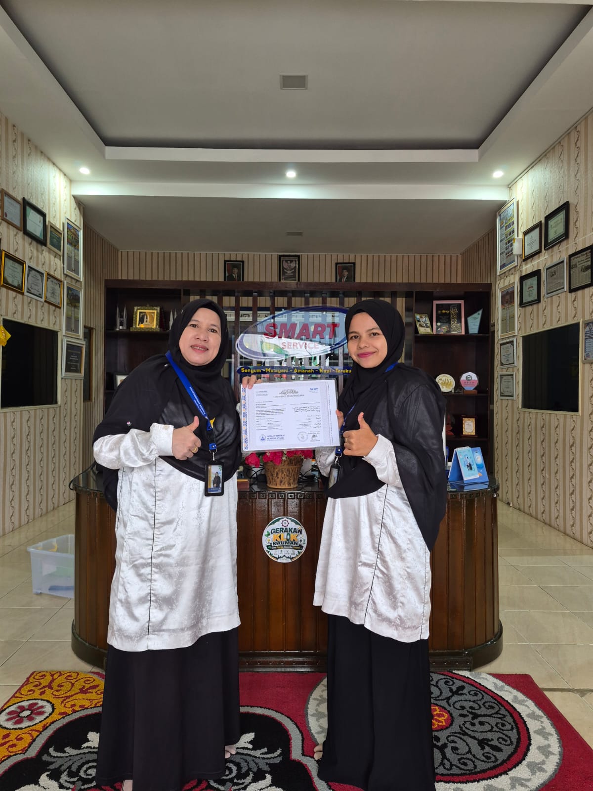 Fitri Rahmi, guru bahasa arab MAS KM Kauman Muhammadiyah padang panjang, peserta aktif kegiatan olimpiade bahasa arab tingkat internasional kategori umum